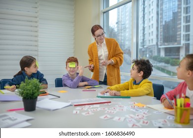 Interactive Lesson. A Young Teacher Using Funny Games In Her Class