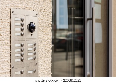 Intercom System, Door Bell Buttons With Microphone And Camera. Entrance Door With Modern Intercom Of Apartment Building.