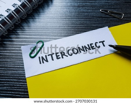 Interconnect writting on table background.