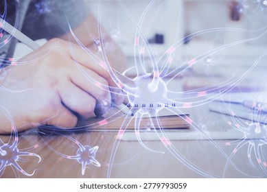 Interconnected neuron cells with glowing link knots in electrical pulses with man working background. Double exposure. - Powered by Shutterstock - Get 15% off with code: PIKWIZARD15