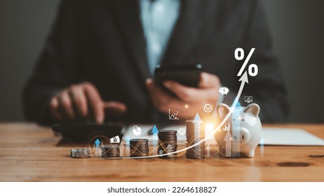 Interest rate and dividend concept, businessman calculating income and return on investment, save, income, return, retirement, compensation fund, investment, dividend tax, stock market, saving, trade.