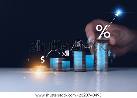 Interest rate and dividend concept. Businessman with percentage symbol and up arrow, Interest rates continue to increase, return on stocks and mutual funds, long term investment for retirement.