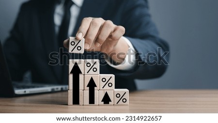 Interest rate and dividend concept,percentage sign symbol print screen on wooden cube block stacking, financial growth, return on stocks and mutual funds, long term investment for retirement.	 Stock fotó © 