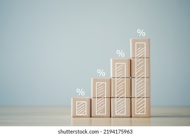 Interest rate finance and mortgage rates concept. Wooden blocks with growth of bar chart percentage sign, financial growth, interest rate increase, inflation, sale price and tax rise concept.
