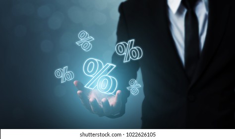 Interest Rate Financial And Mortgage Rates Concept. Businessman Hand Show Icon Percent 3d Sign