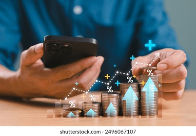 Interest rate increase concept, money percentage commission credit. Bank policy price raise. Businessman use mobile phone, coin, calculator, arrow and percentage symbol, financial banking increase - Powered by Shutterstock