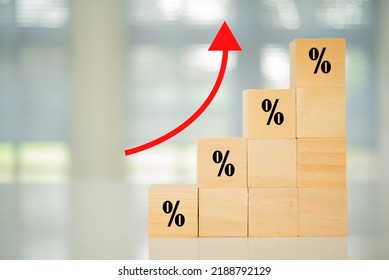 Interest rate rise concept. Wooden blocks with Icon percentage and arrow point up. - Shutterstock ID 2188792129
