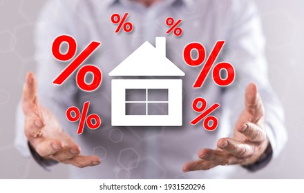 Interest rates concept above the hands of a man in background