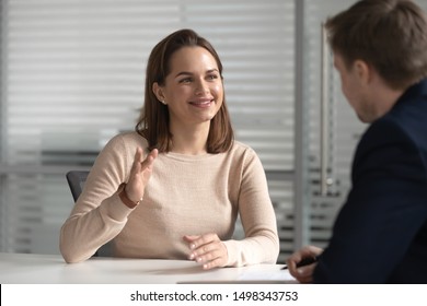 Interested hr male manager or boss holding job interview with young female candidate. Financial advisor, lawyer, real estate agent, bank manager listening to clients wishes or needs at company office. - Shutterstock ID 1498343753