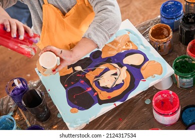 Interested kid boy drawing abstract painting in light workshop during the weekend - Shutterstock ID 2124317534