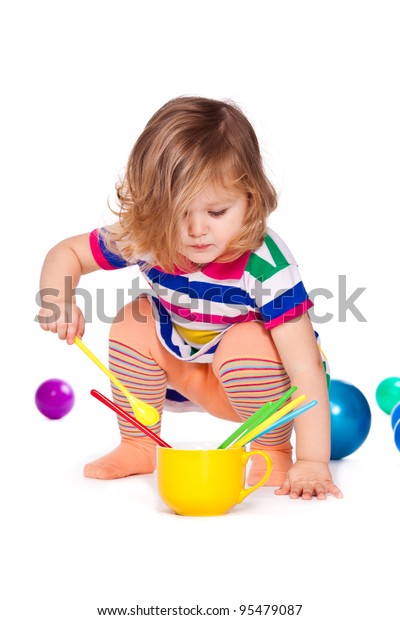 little girl play dishes