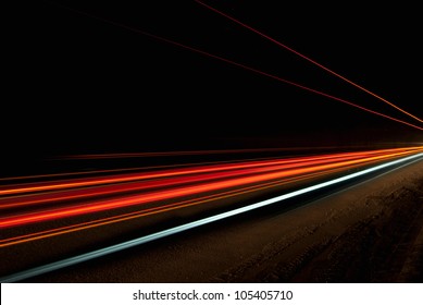 Interesting and abstract lights in a tunnel in orange that can be used as background or texture - Powered by Shutterstock