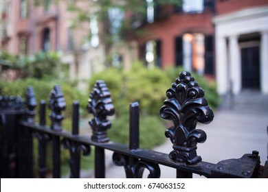 Interesting Iron Fence With Intricate Carving With An Antique, Colonial Style, In The Beacon Hill Neighborhood In Historic Boston.