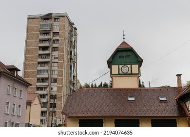 Interesting Roof And A Small House With Clock Tower, Such As Fire Station Or Something Similar In Trbovlje, Slovenia. Old City Block In The Background.