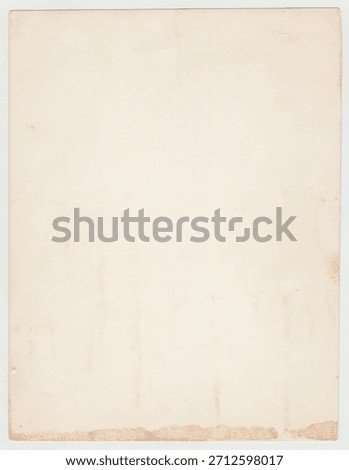 Interesting texture of old paper, soiled and damaged, as well as darkened by time and use, on a white background. Unique vintage texture of old paper which is approximately 60-70 years old.