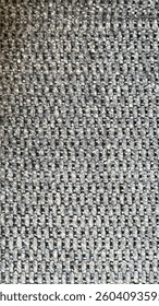 Interesting and textured pattern on the sofa. 