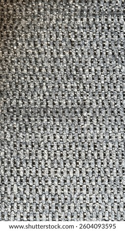 Interesting and textured pattern on the sofa. 