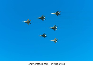 Interesting war planes in triangular shape in blue sky