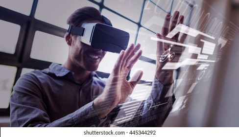 interface against businessman using virtual reality device - Powered by Shutterstock