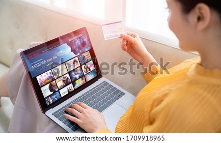 Interface of video distribution service. Subscription service. Streaming video. communication network.