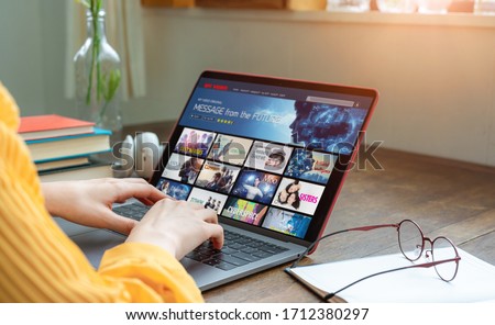 Interface of video distribution service. Subscription service. Streaming video. communication network.