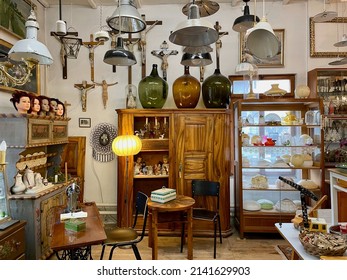 Interior Of An Antique Store With Old Vintage Classical Objects And Furniture. Dornbirn, Austria, 1.04.2022. High Quality Photo