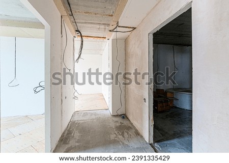 interior apartment rough repair for self-finishing. interior decoration, bare walls of the room, stage of construction