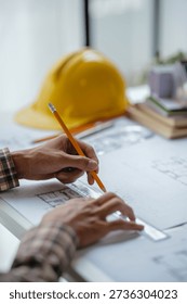 Interior architecture or engineer working on blueprint and planning projects
