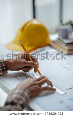 Interior architecture or engineer working on blueprint and planning projects