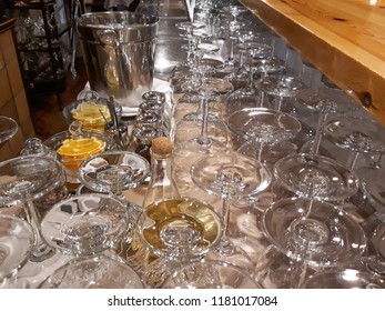 Interior bar image with prepared crockery and glasses and glasses ready to serve