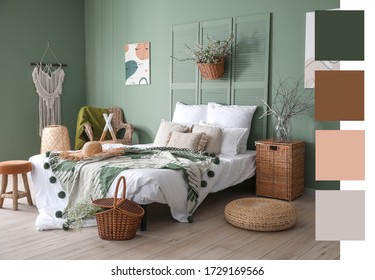 Interior of beautiful modern bedroom with spring flowers. Different color patterns