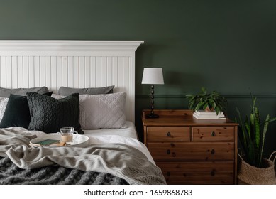 Interior Bedroom With Green Wall, Plants And Copy Space