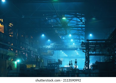 Interior of big industrial building inside in blue color. Factory hangar or workshop with steel constructions. Metallurgy plant. heavy industry