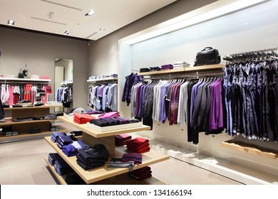 interior of brand new fashion clothes store - Shutterstock ID 134166194