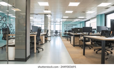 Interior of bright creative workspace with computer desks