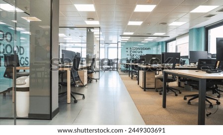 Interior of bright creative workspace with computer desks