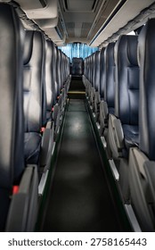 Interior of a bus with empty seats and seats in a row
