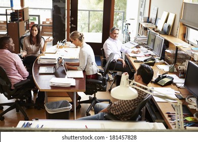 Interior Of Busy Architect's Office With Staff Working