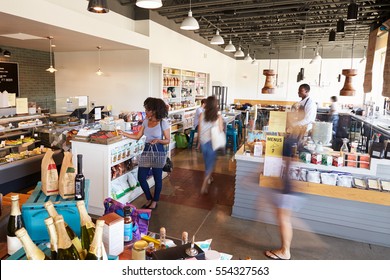 Interior Of Busy Delicatessen With Customers