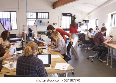 Interior Of Busy Design Office With Staff