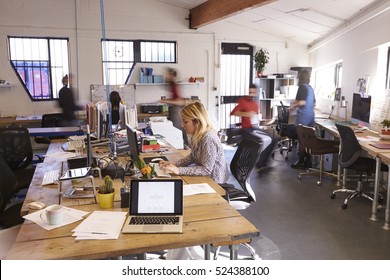 Interior Of Busy Design Office With Staff