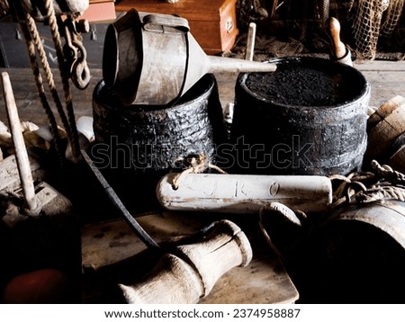 Interior, cabin and vintage tools, equipment and relics, barrels and bellows for storage of gear. Retro room, rustic cottage and old rope, wood and hammer in house, home and architecture in shack