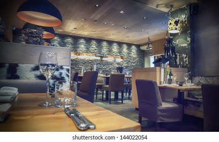 interior of cafe with stylish stone wall