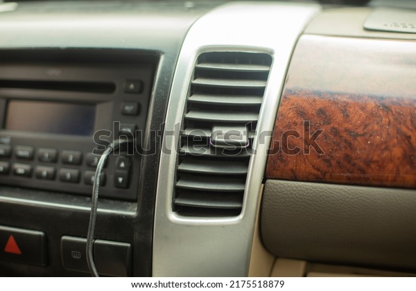 Interior of\
car. Machine from inside. Interior of car. Panels and handles in\
transport. Classic style of interior of\
car.