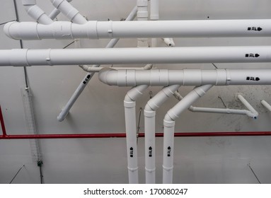 Interior Of Car Park Ceiling With Pipe And Fire Sprinkler System