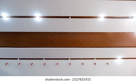 Interior Ceiling Of A Multipurpose Building With Lights On