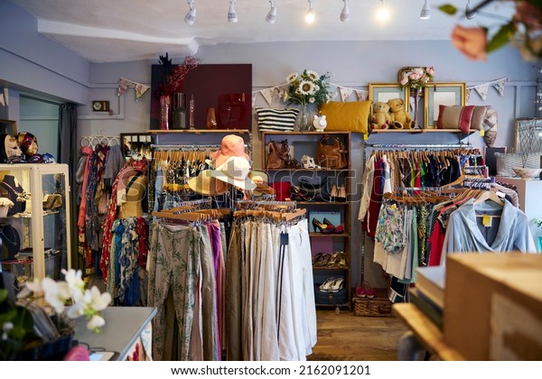 Interior Of Charity Shop Or
Thrift Store Selling Used And Sustainable Clothing And Household
Goods