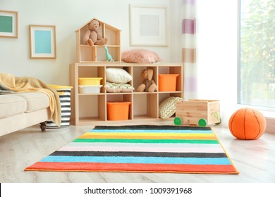 Interior Of Child's Room With Colorful Carpet