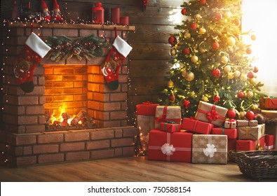 interior christmas. magic glowing tree, fireplace and gifts  