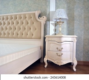Interior in classical style, a luxurious bedroom.